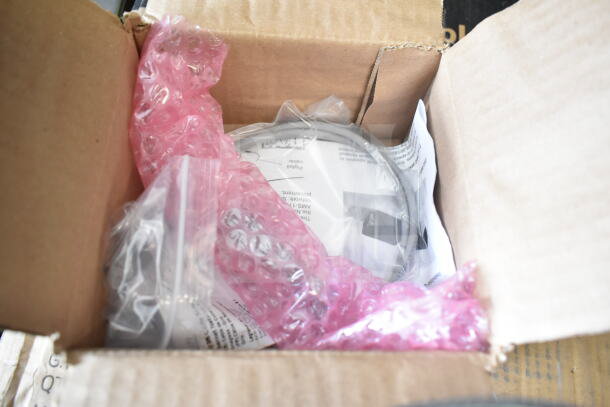 Box containing Sensormatic 0352-0659-01 Ethernet Isolators with protective bubble wrap and cables.