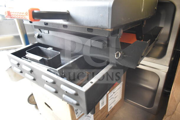 Flat Top Griddle for Grill, features durable metal construction, integrated drip tray, and heat-resistant handles. Good condition.