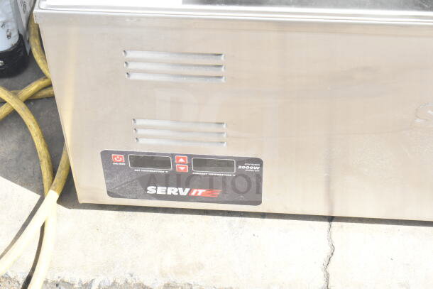 BRAND NEW ServIt 423FW200D dual well electric countertop food warmer, digital controls, 120V, visible scratch and dent.