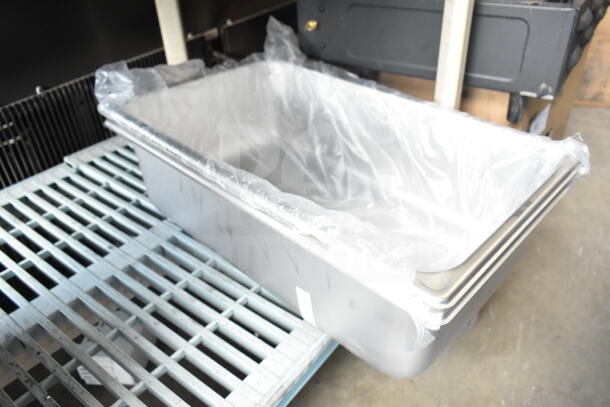 Brand new Vigor full-size 6" deep stainless steel steam table pan with anti-jam feature, shown packaged.