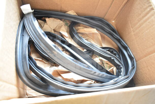 Brand new True 948165 door gasket for T-43, shown in a box. Slight scratches and dents visible.