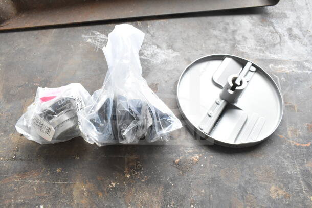 5 brand new items, including Robot Coupe blade, MainStreet Equipment oven knob, and Cleveland timer, in packaging.