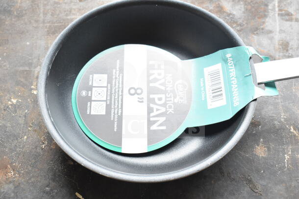 8 new Choice 8" aluminum non-stick fry pans with minor scratches. Suitable for electric, gas, and halogen. Made in China.