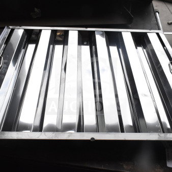 Stainless steel hood filter, 16"H x 16"W x 2"T, brand new with visible scratches and dings, features handles for easy use.