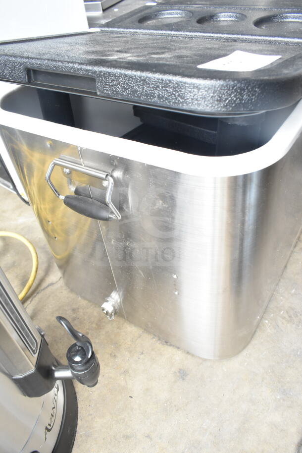 Brand new stainless steel cooler, scratch and dent condition. Features durable handle and spout for easy drainage.
