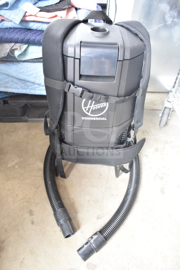 BRAND NEW SCRATCH AND DENT! Hoover CH93600 Cordless Backpack Vacuum Kit, 40V, with 10 bags, 8.0 Ah battery, and charger.
