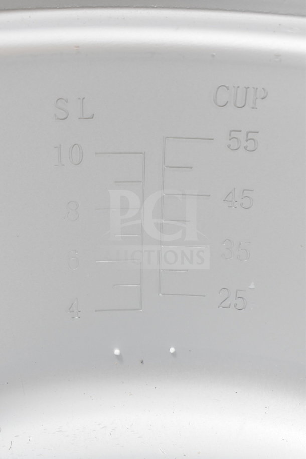 Avantco 177GRC110LP gas rice cooker's inner pot close-up, showing measurements for 55 and 25 cups, new condition.