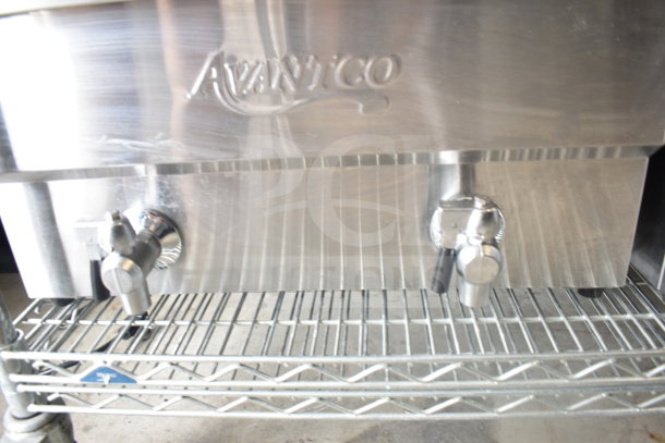 Brand new Avantco 177F202 dual tank fryer, 30 lb capacity, visible in stainless steel. Scratch and dent condition.