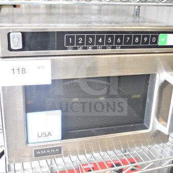 2026 Solwave HDC12A2 stainless steel commercial microwave, push-button controls, 120V, minor scratches, shelf display.