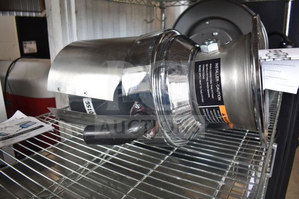 Brand new InSinkErator SS-100-47 commercial garbage disposer, 208/230/460V, 3 phase. Visible caution label, minor scratches.