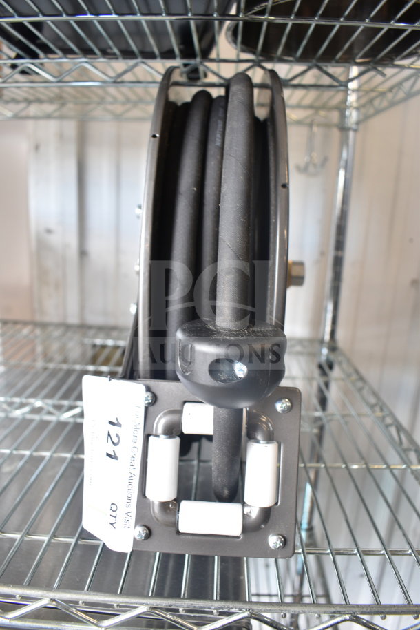 Equip 5HR-232 hose reel with 35' hose, 2.27 GPM spray valve; new, scratch and dent condition, visible label with item number.