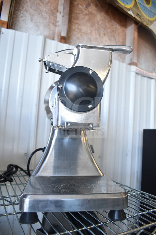 Brand new Estella 348CG34 electric cheese grater for auction. Grates 1.4 lb/min. 120V. Scratch and dent condition.