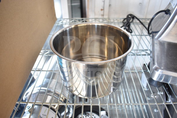 Brand new Estella 348CG34 hard cheese grater, 1.4 lb/min, 120V, stainless steel, visible scratch and dent.