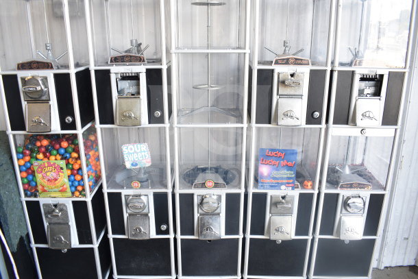 Five double stack vending machines with visible candy displays. Includes slots for 25 and 50 cent coins, labeled for "Sour Sweets" and "Lucky Me."