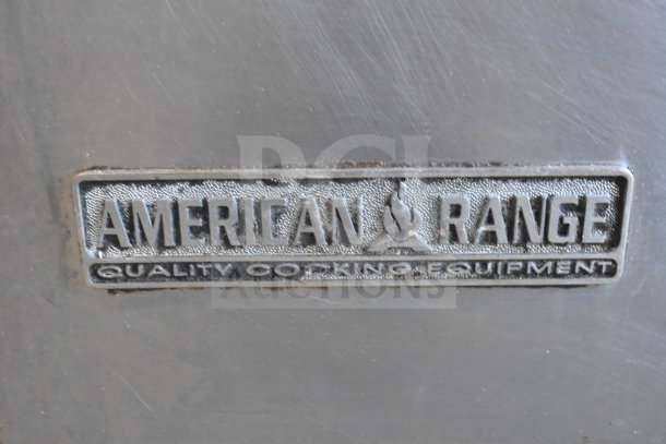 American Range logo on stainless steel surface of commercial gas range, marked "Quality Cooking Equipment."