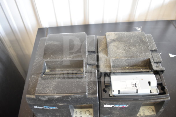 5 receipt printers including Epson and Star TSP100III, dusty condition, visible model markings, suitable for resale.