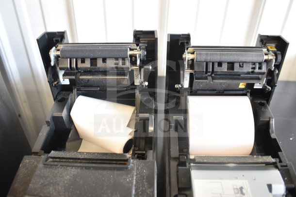 5 receipt printers, including Epson and Star TSP100III, open with visible paper rolls, showing internal mechanisms.