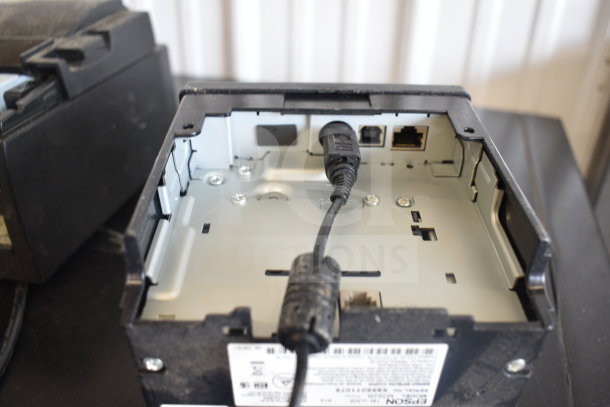 Five receipt printers, including Epson and Star TSP100III models, in used condition with visible connectivity ports.