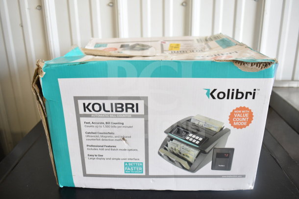 Kolibri Automatic Bill Counter in original box, 110 Volts, 1 Phase, fast counting up to 1,500 bills/minute, counterfeit detection.