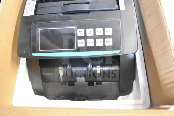 Kolibri Automatic Bill Counter in original box, 110 Volts, like new with keypad and display screen visible.