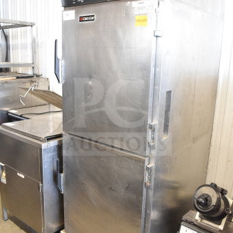 CreCor Commercial Heated Holding Cabinet, stainless steel, on casters, temperature controls, and gauges visible, good condition.