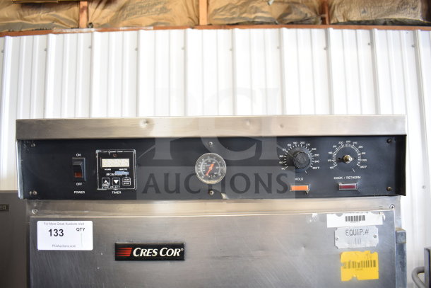 CreCor Commercial Heated Holding Cabinet, features dials, timer, labels, and branding. Mounted on commercial casters.
