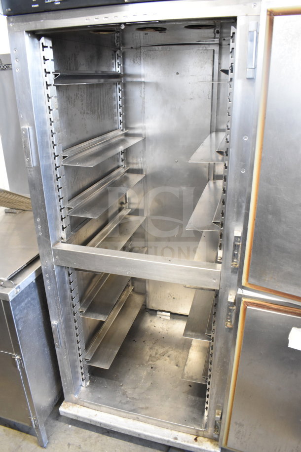 CreCor Commercial Heated Holding Cabinet on casters, stainless steel, multiple adjustable shelves, used condition.