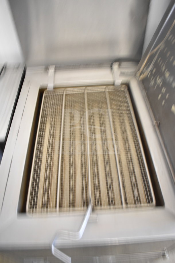 Baxter SP155G-M1826 commercial donut fryer, floor style, natural gas powered, clean condition, includes cooking grates.