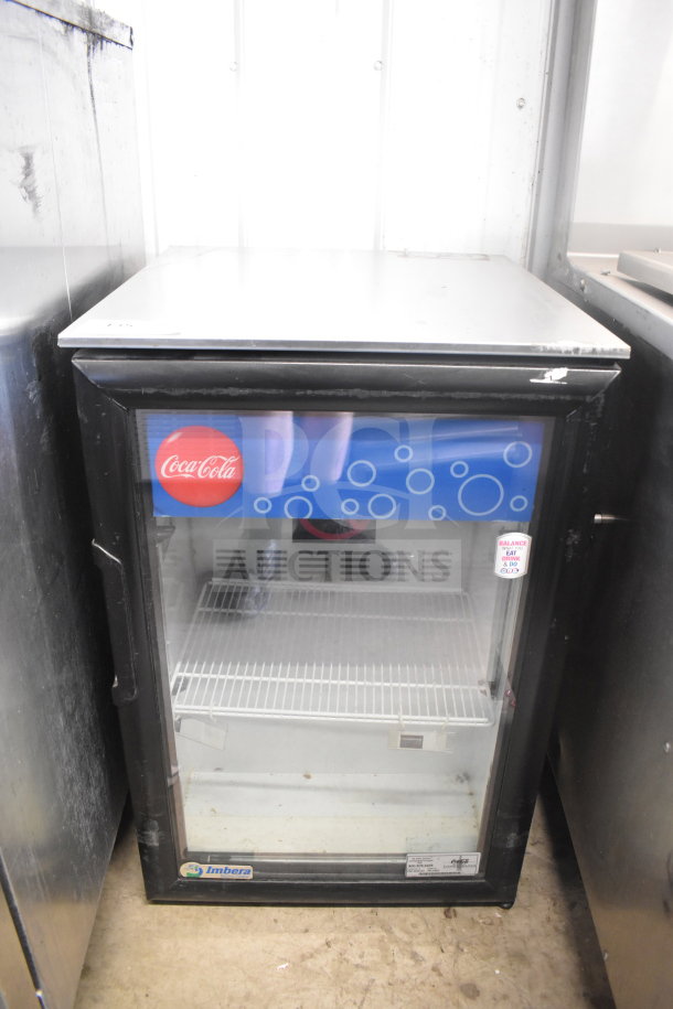 Imbera EVC04 Commercial Mini Cooler Merchandiser, 115V, 1 Phase. Features glass door, Coca-Cola branding, visible shelving.
