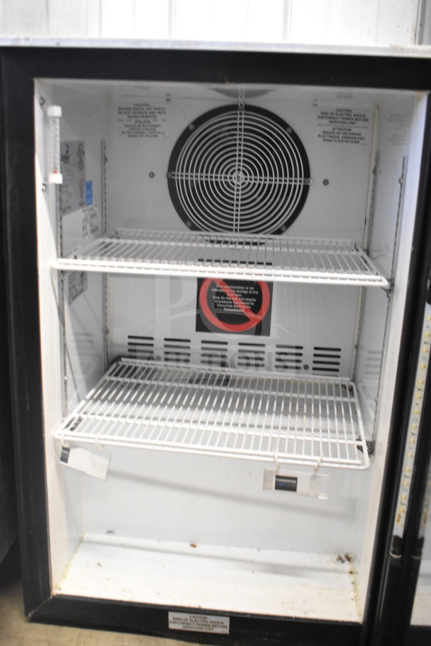 Imbera EVC04 commercial mini cooler merchandiser with white shelving. 115 volts, 1 phase. Visible wear on interior.