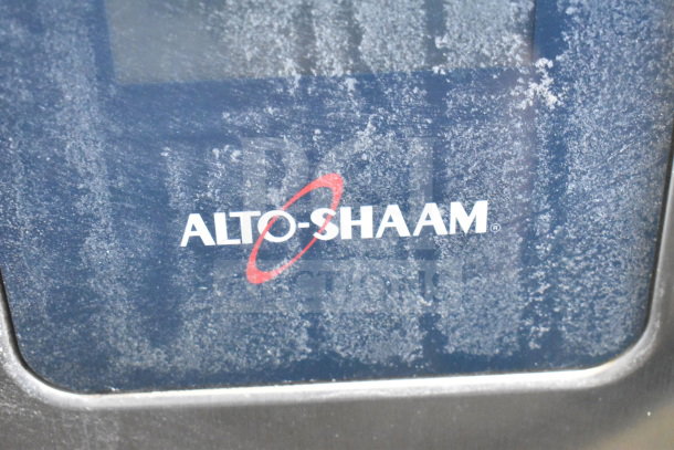 Alto Shaam CTP10-10E stainless steel combi convection oven with visible logo on door.
