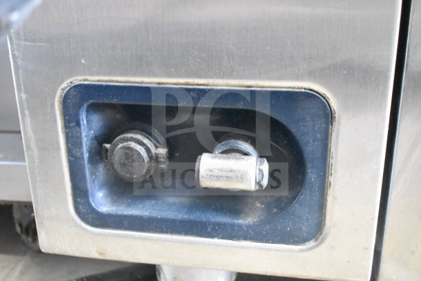 Alto Shaam CTP10-10E stainless steel control panel showing knobs and dials. Used condition.