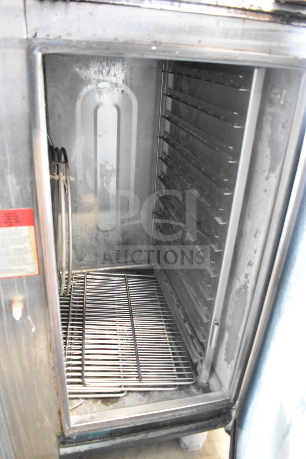 Alto Shaam CTP10-10EVH stainless steel combi oven interior with racks. Used condition, compatible with 208/240V, 3-phase power.