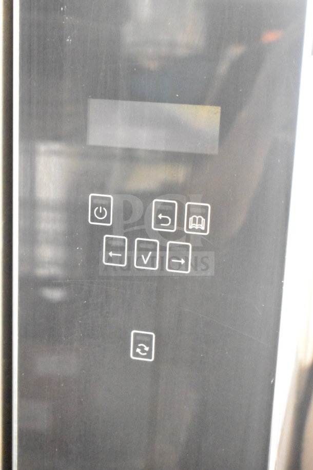 Fri-jado TDR 7-P rotisserie oven control panel, electric powered, black finish, shown with operational buttons and display.