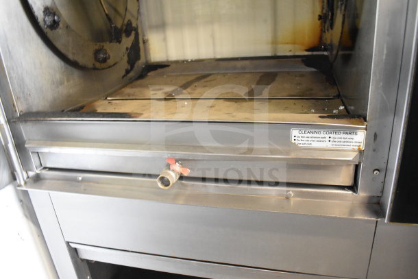 Fri-jado TDR 7-P rotisserie oven, stainless steel, commercial casters, 208V, 3-phase, cleaning instruction label visible.