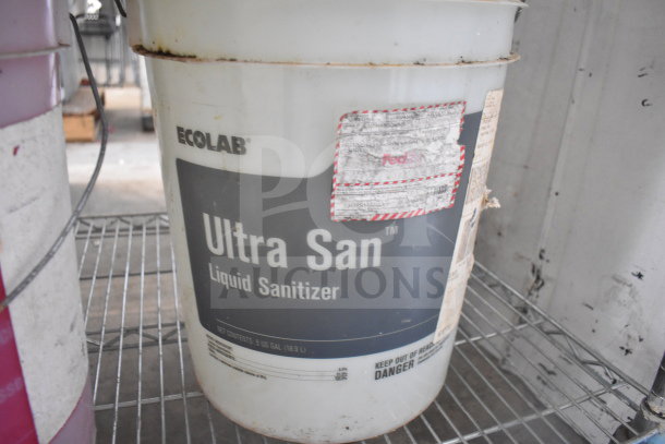 Ecolab Ultra San Liquid Sanitizer barrel, visible label with warnings, 5-gallon capacity, auction for 2 barrels.