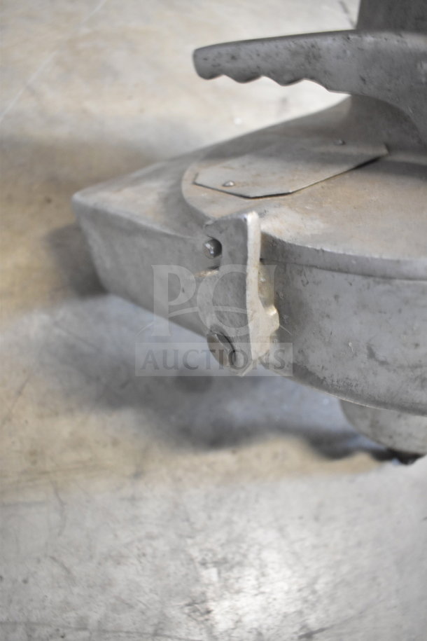 Pelican head in metal, showing the attachment point; part of a set with S Blade and Whisk Attachment; seasoned condition.