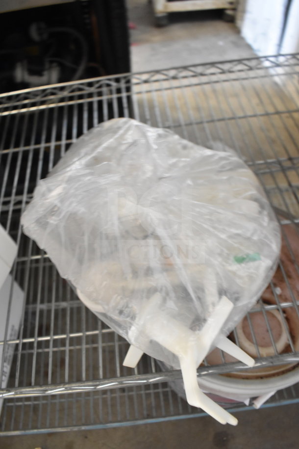 Popeil P400 Automatic Pasta Maker, wrapped in plastic, visible components, on a metal shelf; 120 Volts, 1 Phase.