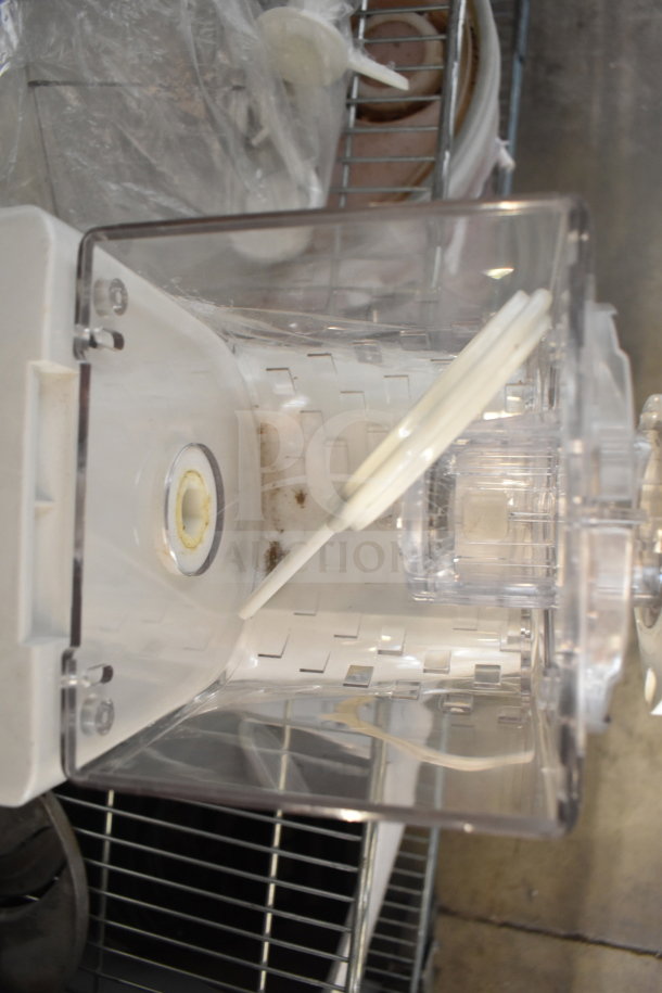 Popeil P400 Automatic Pasta Maker, 120V, clear plastic container, includes mixing paddle, shows minor wear.