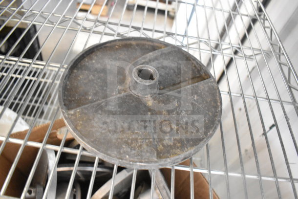 20 various kitchen items including used food processor blades, metal design, slightly worn condition, visible shelf storage.