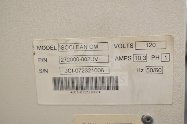 Johnson Controls Isoclean CM air filter label, 120V, 1 phase, 10.3 amps, model info visible.