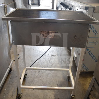 Hilliard's Floor Style Chocolate System, 120 Volts, 1 Phase, metal frame, wheeled base, label visible on front panel.