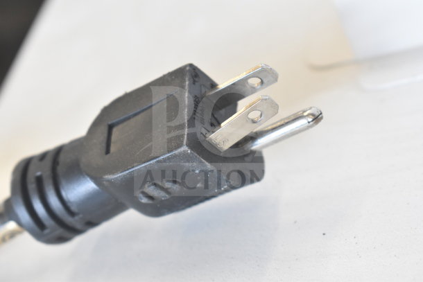 Close-up of a power plug attached to the Johnson Controls Isoclean CM Commercial Air Filter, 120 Volts, 1 Phase.