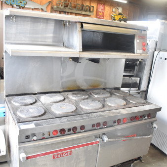 Vulcan ESB60 commercial electric 10-burner hot plate range with 2 ovens, over shelf, and back splash, 208V, 3-phase, used condition.