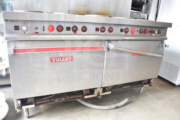 Vulcan ESB60 commercial electric 10 burner hot plate range with 2 ovens, over shelf, and backsplash. 208V, 3-phase. Used condition.