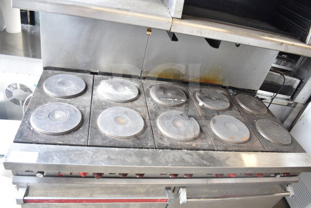 Vulcan ESB60 commercial electric 10-burner range with dual ovens, over shelf, and backsplash. 208V, 3-phase. Slight wear visible.