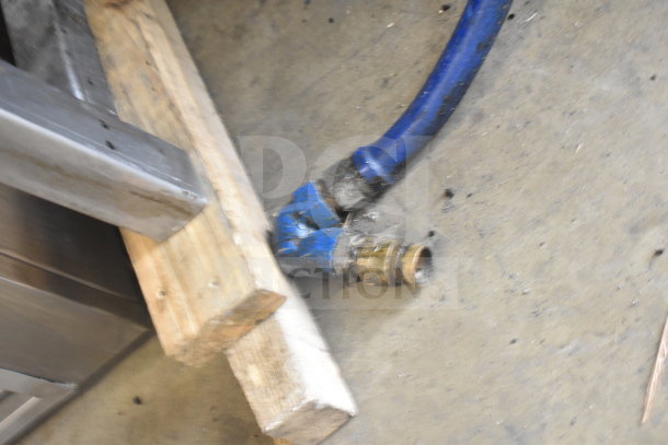Blue propane gas hose and brass connector for 2022 Nieco FH94G BroilVection Burger Grill, showing connection details.