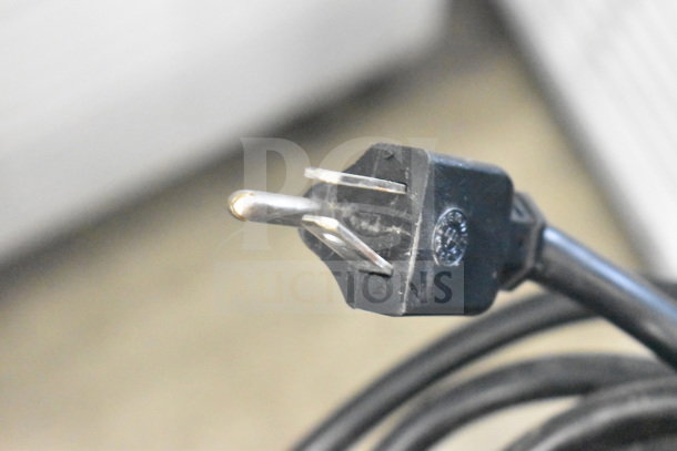 Power cord of a Leader FR30 S/C cooler, showing standard 115V, 1 phase plug in good condition.