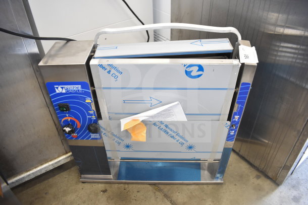 Brand new Prince Castle 297 T9 Slim Line Bun Toaster, 115V, with minor scratches. Model label and controls visible.