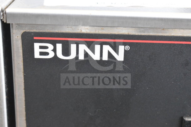 Bunn IC3 commercial countertop iced tea machine, stainless steel, 120/208 volts, single phase, close-up of brand logo.